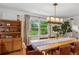 Inviting dining room showcasing hardwood floors and a modern chandelier at 3772 Evans Rd, Atlanta, GA 30340