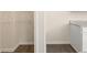 View of a walk in closet and a partial view of the kitchen counter at 8230 Coldstream Dr, Fairburn, GA 30213