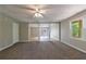 View of open basement floor plan into patio and backyard access at 1523 Fallen Leaf Dr, Marietta, GA 30064