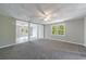Open basement floor plan with view into living area with patio access and a view of the backyard at 1523 Fallen Leaf Dr, Marietta, GA 30064