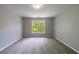 Bedroom with carpet flooring and natural light from a window at 1523 Fallen Leaf Dr, Marietta, GA 30064