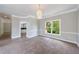 Elegant dining room featuring a crystal chandelier and classic wainscoting at 1523 Fallen Leaf Dr, Marietta, GA 30064