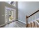 Bright foyer with wood and white staircase, features natural light, and modern gray walls at 1523 Fallen Leaf Dr, Marietta, GA 30064