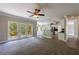 Spacious living room with stone fireplace and views of the open kitchen at 1523 Fallen Leaf Dr, Marietta, GA 30064