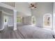 Spacious living room with tall ceilings, large windows, and plush carpeting at 1523 Fallen Leaf Dr, Marietta, GA 30064