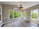 Sunroom with lots of windows, a hanging light fixture and gray walls at 1523 Fallen Leaf Dr, Marietta, GA 30064