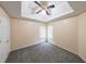 Cozy bedroom featuring a modern ceiling fan and natural light from two windows at 1528 Rogers Crossing Dr, Lithonia, GA 30058