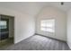 Bedroom featuring a neutral wall color, carpet flooring, and natural light at 1528 Rogers Crossing Dr, Lithonia, GA 30058