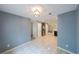 This airy dining area features tile floors and access to the kitchen at 1528 Rogers Crossing Dr, Lithonia, GA 30058