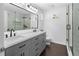 Bathroom featuring a double vanity, a glass shower, and modern fixtures at 202 Windcroft Nw Ct, Acworth, GA 30101