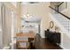 Open concept dining and living area showcasing staircase and kitchen at 202 Windcroft Nw Ct, Acworth, GA 30101