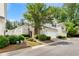 Charming two-story home with attached two-car garage, stone accent and lush landscaping at 202 Windcroft Nw Ct, Acworth, GA 30101