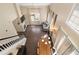 Open concept living room and dining area showcasing staircase and fireplace at 202 Windcroft Nw Ct, Acworth, GA 30101