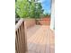 Exterior view of a wood backyard deck, perfect for enjoying the outdoors at 2115 Charter Ln, Lithonia, GA 30058