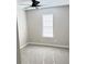 Cozy bedroom with neutral walls, plush carpeting, and ample natural light at 2115 Charter Ln, Lithonia, GA 30058