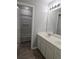Bathroom featuring double vanity and a shower-tub combination at 6121 Joybrook Rd, Johns Creek, GA 30097