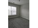 Neutral bedroom with a window and carpet at 6121 Joybrook Rd, Johns Creek, GA 30097