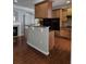 Open-concept kitchen with wooden cabinets, granite countertops, and stainless steel appliances at 6121 Joybrook Rd, Johns Creek, GA 30097