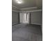 Main bedroom showcasing tray ceiling and large doorways at 6121 Joybrook Rd, Johns Creek, GA 30097