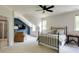 Bedroom showcasing natural light, an accent wall, and a spacious layout at 1575 Spalding Dr, Sandy Springs, GA 30350