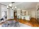 Open concept kitchen and dining room featuring stainless steel appliances and lots of natural light at 1575 Spalding Dr, Sandy Springs, GA 30350