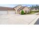 Lovely home exterior boasting an attached garage and well-maintained landscaping at 202 Accord Sw Ln, Grayson, GA 30017