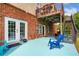 Patio with outdoor seating and access to the upper deck, ideal for enjoying the outdoor setting at 209 Braemar Ct, Mcdonough, GA 30253
