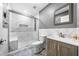 Modern bathroom with glass enclosed shower, stylish vanity and elegant finishes to provide a spa-like retreat at 209 Braemar Ct, Mcdonough, GA 30253