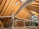 Unfinished attic with exposed ductwork and HVAC system at 3212 Woodhaven Sw Ct, Conyers, GA 30094
