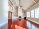 Spacious living room with hardwood floors, a fireplace, and a soaring ceiling at 3212 Woodhaven Sw Ct, Conyers, GA 30094