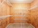 Empty walk-in closet with wire shelving at 3212 Woodhaven Sw Ct, Conyers, GA 30094