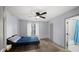 Bright bedroom with a ceiling fan and a modern en suite bathroom at 3407 Spring Harbour Dr # 2, Doraville, GA 30340