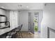 Bright kitchen featuring stainless steel appliances, quartz countertops, and a view to the exterior at 3407 Spring Harbour Dr # 2, Doraville, GA 30340