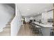 Open-concept kitchen with stainless steel appliances, bar stool seating and light wood flooring at 3407 Spring Harbour Dr # 2, Doraville, GA 30340