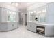 Elegant primary bathroom with marble floors, double vanities, and custom-built cabinetry at 4500 Candacraig, Alpharetta, GA 30022