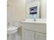 Clean bathroom featuring a white vanity, toilet, shower and tile flooring at 4500 Candacraig, Alpharetta, GA 30022