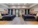 Bedroom featuring two beds, dark furnishings, decor, and hardwood floors at 4500 Candacraig, Alpharetta, GA 30022