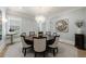 Formal dining room featuring round table, elegant chairs, and stylish decor at 4500 Candacraig, Alpharetta, GA 30022