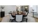 Formal dining room featuring round table, elegant chairs, and stylish decor at 4500 Candacraig, Alpharetta, GA 30022