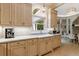 Bright kitchen featuring white marble countertops and subway tile backsplash, coffee and breakfast station at 4500 Candacraig, Alpharetta, GA 30022
