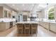 Bright kitchen with granite counters, stainless appliances, large island and overhead lighting at 4500 Candacraig, Alpharetta, GA 30022