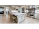 Well-equipped kitchen with granite countertops, stainless steel appliances and a spacious design at 4500 Candacraig, Alpharetta, GA 30022
