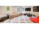 Cozy living room with large area rug, comfortable sofa, and modern decor at 4500 Candacraig, Alpharetta, GA 30022