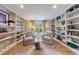Bright and airy living space with custom built-in bookshelves and comfortable seating at 4500 Candacraig, Alpharetta, GA 30022