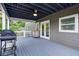 Outdoor deck with a ceiling fan and a grill perfect for entertaining guests at 1740 Bouldercrest Se Rd, Atlanta, GA 30316