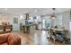 Modern kitchen features stainless steel appliances, a large island, and a farmhouse dining table at 1740 Bouldercrest Se Rd, Atlanta, GA 30316