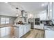 Bright and open kitchen with stainless steel appliances, granite countertops, and hardwood floors at 1740 Bouldercrest Se Rd, Atlanta, GA 30316