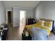 Bright and airy bedroom with hardwood flooring and ample natural light at 2436 Moultrie Ct, Dacula, GA 30019