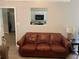 Cozy living room featuring hardwood floors, neutral paint and comfortable seating at 2436 Moultrie Ct, Dacula, GA 30019