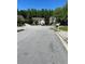 Peaceful residential street view showcasing well-maintained homes and lush greenery at 2436 Moultrie Ct, Dacula, GA 30019